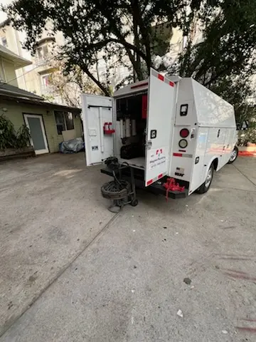 Magnet Plumbing service vehicle on-site for Grease Trap Cleaning in Ingleside